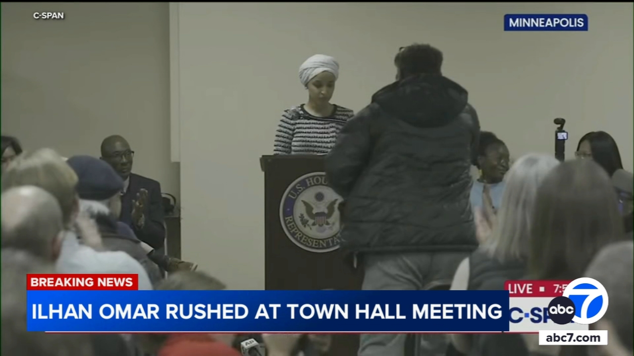 Man tackled to ground after spraying unknown substance on Rep. Ilhan Omar at Minneapolis town hall